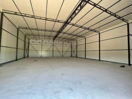 A warehouse is available for rent near Megatek.