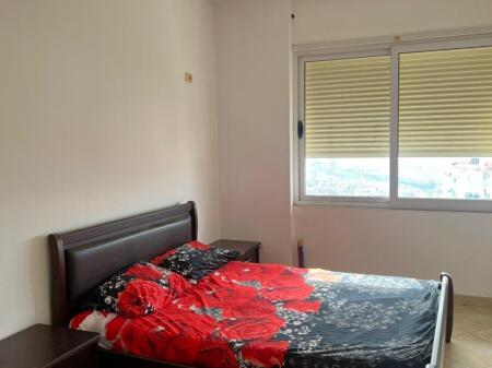 A 2+1 apartment is available for rent in Qesarake, near the Murages restaurant.