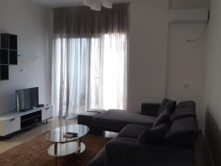 A 1+1 apartment is available for rent at the Kamez turn.