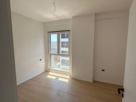 For sale apartment 3+1 in Kamez. The apartment has an area of 124m2. It is organized into: Living room + Kitchen, 3 Bedrooms, 2 Bathrooms. The building is located in a very frequented area, as well as in a very quiet area that offers a very comfortable living. Ready for living within a month!