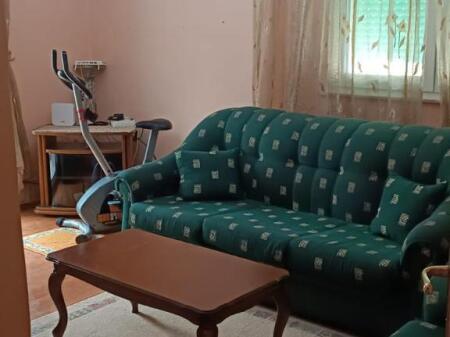 An apartment 2+1 is for rent near the center in Tirana.