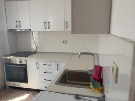 Empty apartment available in the building with arrow