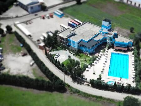 Business property suitable for a venue  hotel with a pool and yard for sale or rent
