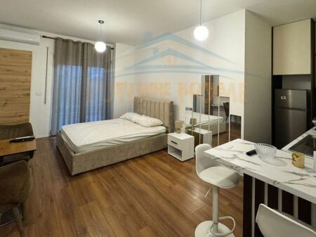 Qira, Garsoniere, Kodra e Diellit, Tiranë