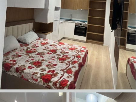 Gazonier me  Qera tek Liqeni Thate