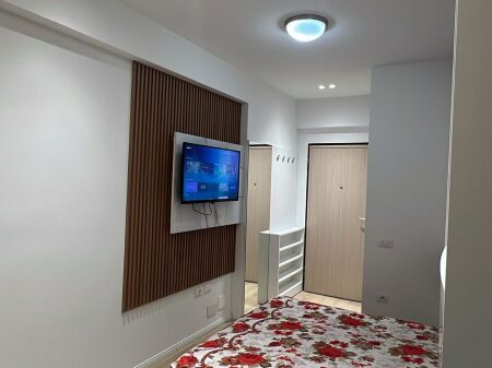 Gazonier me  Qera tek Liqeni Thate