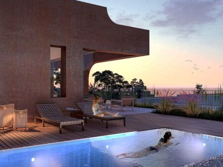 Twin villa with pool for sale in green coast