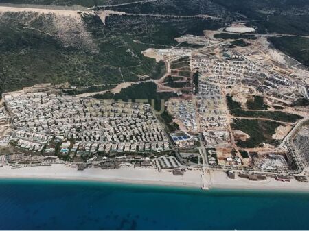 Apartment 1+1+Storage with Veranda and Parking Spot for Sale in Green Coast 2, Palasë !